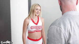 Couple mid-scene in a dim bedroom