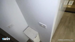 Couple mid-scene in a dim bedroom