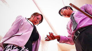 Pair of performers in motion on a wide bed