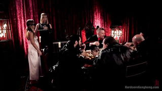 Explicit massage scene in a softly lit room