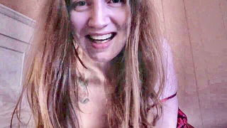 Explicit massage scene in a softly lit room