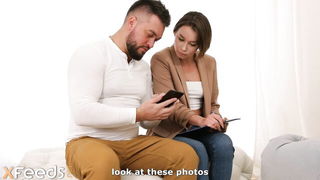 Couple mid-scene in a dim bedroom