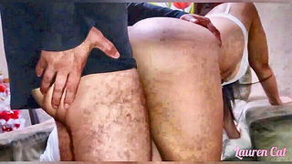 Explicit doggy style scene on a wide bed