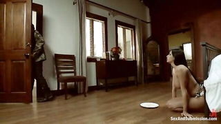 Solo performer with a toy on rumpled bedsheets