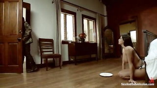 Solo performer with a toy on rumpled bedsheets