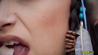 Close frame of an explicit scene in sharp indoor light