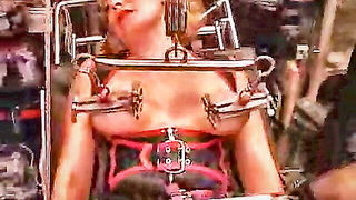Solo performer with a toy on rumpled bedsheets