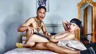 Pair of performers in motion on a wide bed