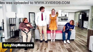 Couple on a made bed in an explicit scene
