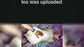 Explicit doggy style scene on a wide bed