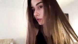 Explicit massage scene in a softly lit room