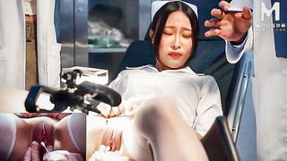 Couple on a made bed in an explicit scene
