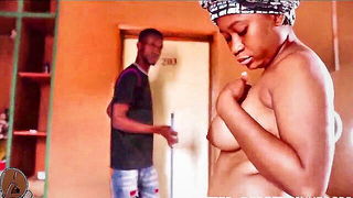 Couple mid-scene in a dim bedroom