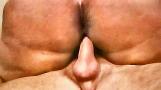 Close frame of an explicit scene in sharp indoor light