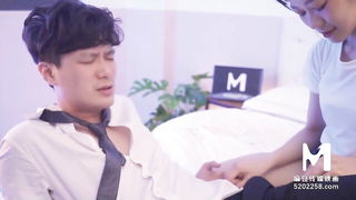 Couple mid-scene in a dim bedroom