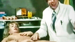 Couple on a made bed in an explicit scene