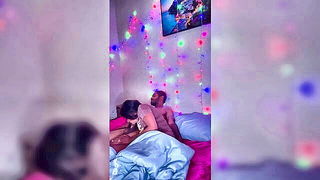 Pair of performers in motion on a wide bed