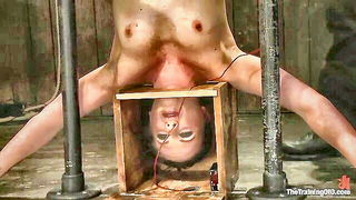 Explicit massage scene in a softly lit room