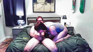 Pair of performers in motion on a wide bed