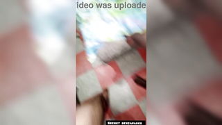 Couple mid-scene in a dim bedroom