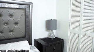 Explicit massage scene in a softly lit room