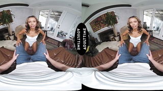 Pair of performers in motion on a wide bed
