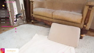 Explicit massage scene in a softly lit room