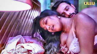 Explicit doggy style scene on a wide bed