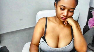 Explicit massage scene in a softly lit room