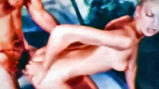 Pair of performers in motion on a wide bed