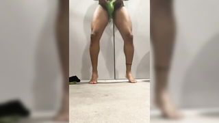 Solo performer with a toy on rumpled bedsheets