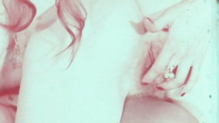 Explicit massage scene in a softly lit room