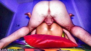 Explicit doggy style scene on a wide bed