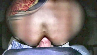 Explicit doggy style scene on a wide bed