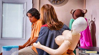 Couple mid-scene in a dim bedroom