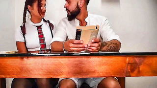 Amateur couple on a living room sofa in explicit scene