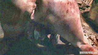 Explicit massage scene in a softly lit room