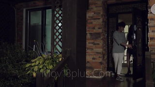 Explicit massage scene in a softly lit room