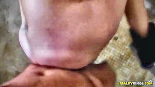 Close frame of an explicit scene in sharp indoor light