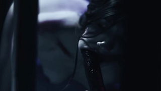 Close frame of an explicit scene in sharp indoor light