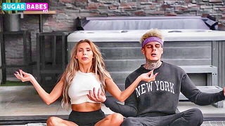 Pair of performers in motion on a wide bed