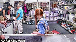 Solo performer with a toy on rumpled bedsheets