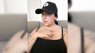 Explicit massage scene in a softly lit room
