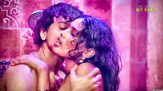 Couple on a made bed in an explicit scene