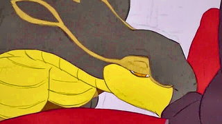 Explicit massage scene in a softly lit room