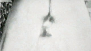 Close frame of an explicit scene in sharp indoor light