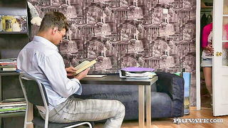 Couple mid-scene in a dim bedroom