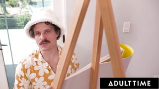 Couple mid-scene in a dim bedroom