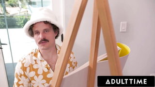 Couple mid-scene in a dim bedroom