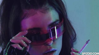 Studio set with performers in an explicit scene under bright lights